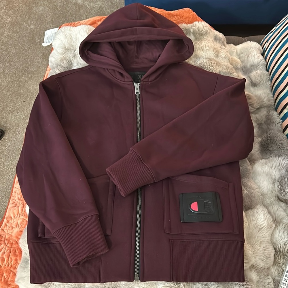 Coach X champion size small ( but runs big)